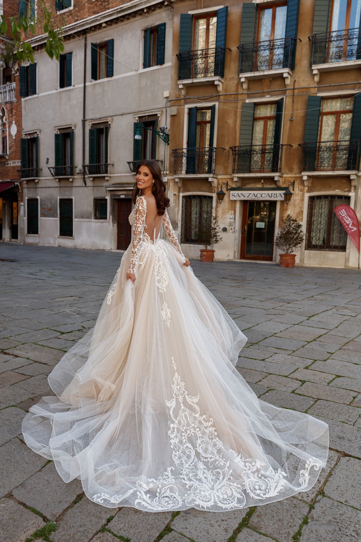 Luxurious lace wedding dress Grays with long sleeves, deep v-neckline, removable skirt and illusion back by famous Oksana Mukha designer, nz 8