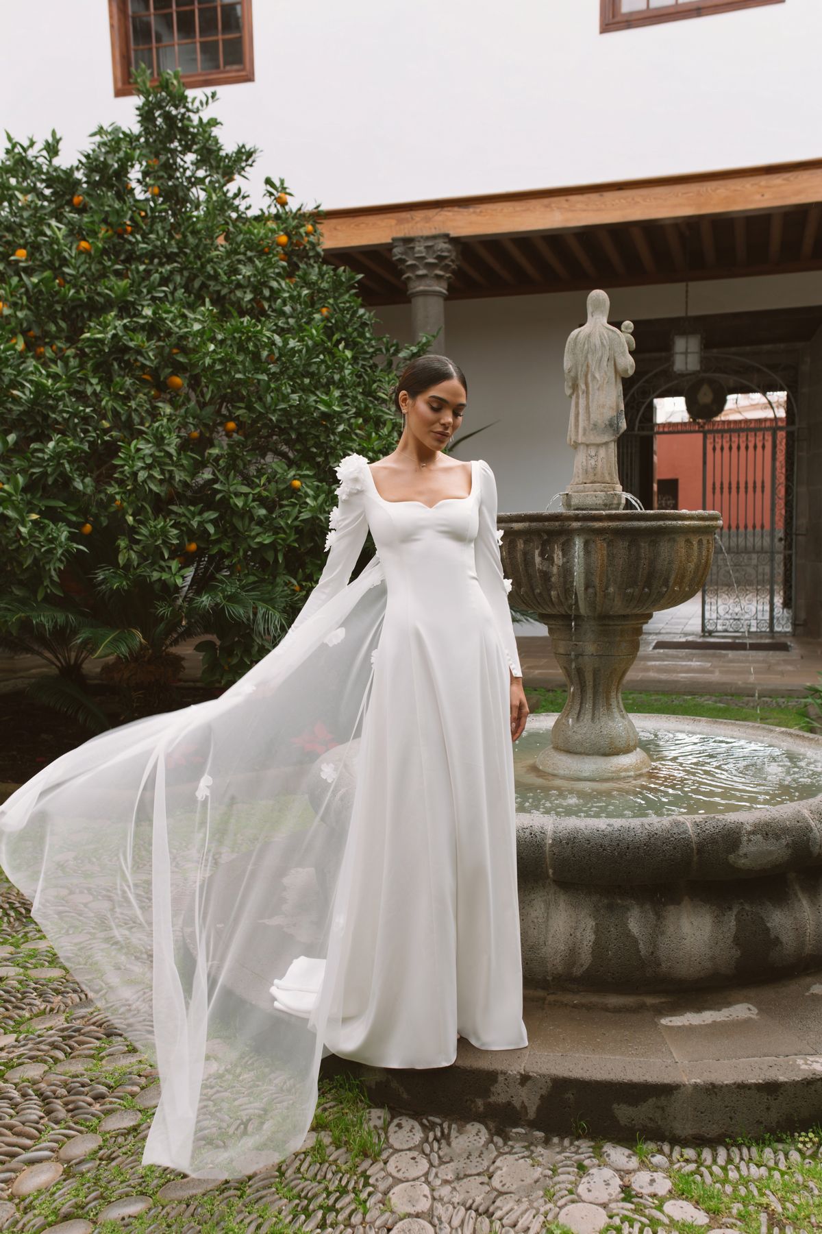 long sleeves wedding dress Vanda decorated with flowers at Dell'Amore Bridal, NZ. 9