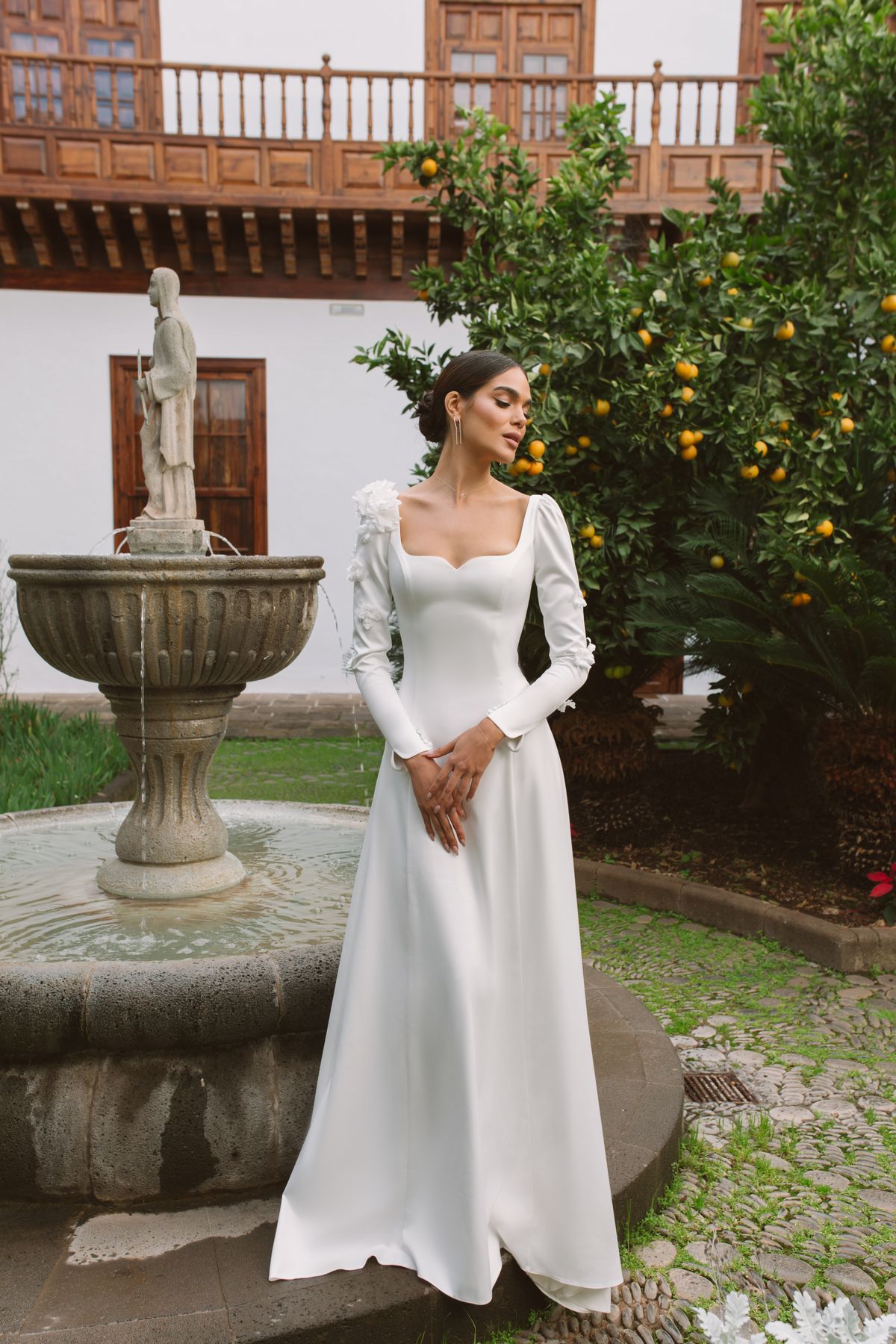 long sleeves wedding dress Vanda decorated with flowers at Dell'Amore Bridal, NZ. 6