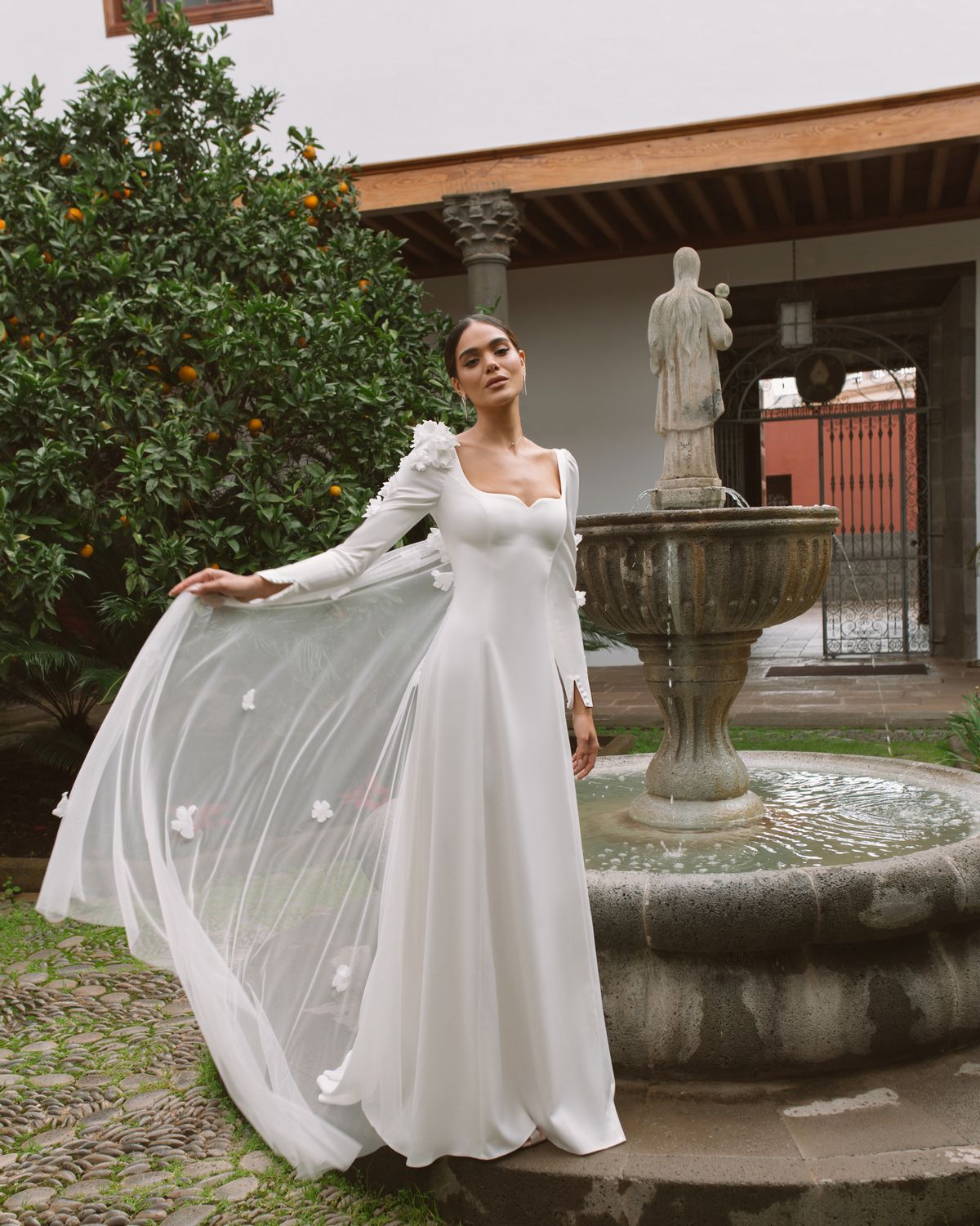 long sleeves wedding dress Vanda decorated with flowers at Dell'Amore Bridal, NZ. 5