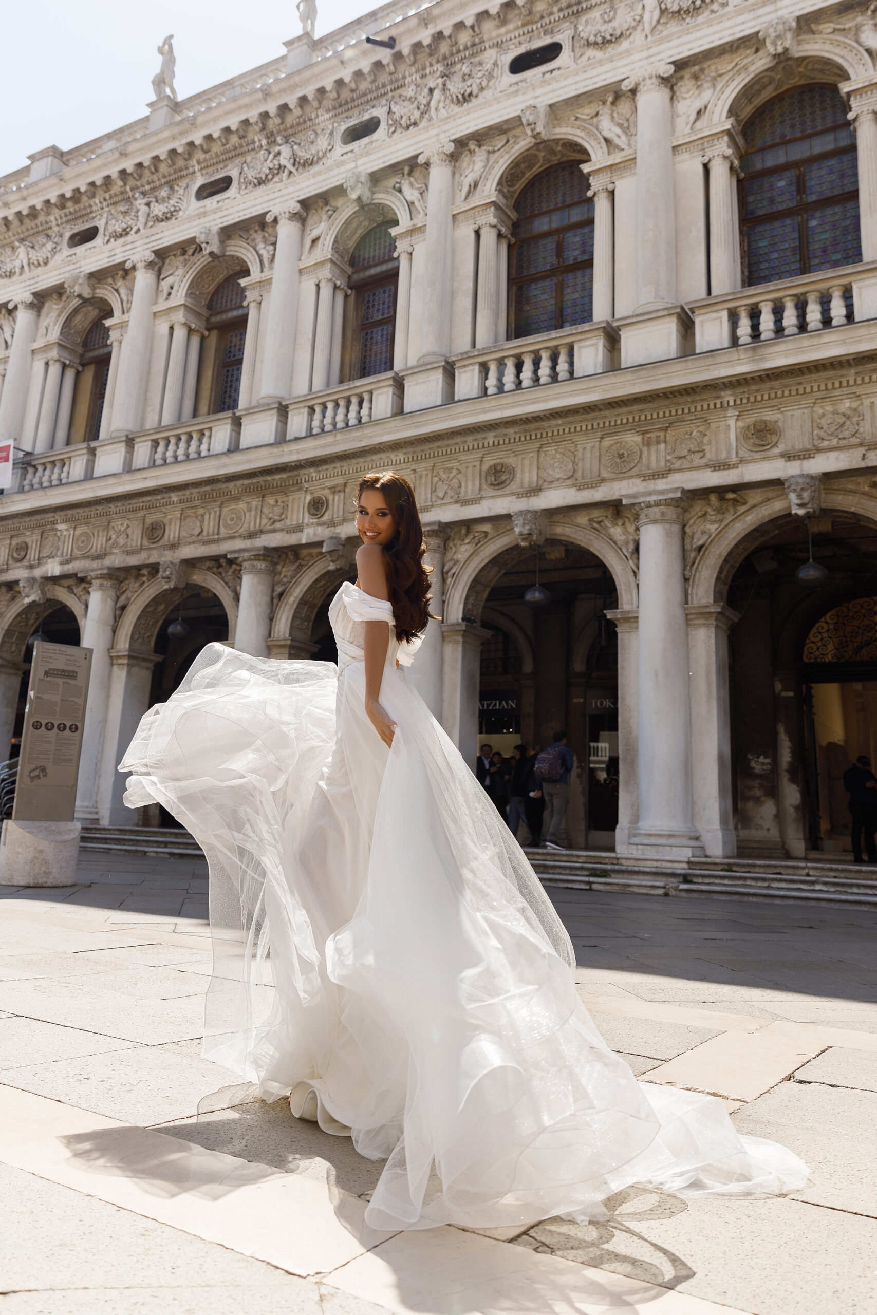 Luxurious sparkling minimalist wedding dress Athena with off-shoulder sleeves, removable skirt and beaded belt by Oksana Mukha designer, nz 4