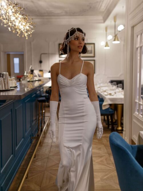 Rara Avis wedding dress Alita mermaid silhouette with thin straps, open back and small train at Dell'Amore Bridal, NZ. 1