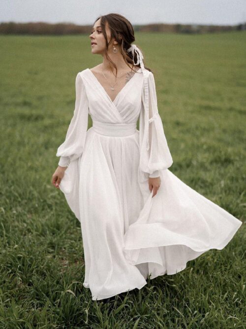 A-line midi wedding dress Paulina with long volumised sleeves by Ange Etoiles. 1