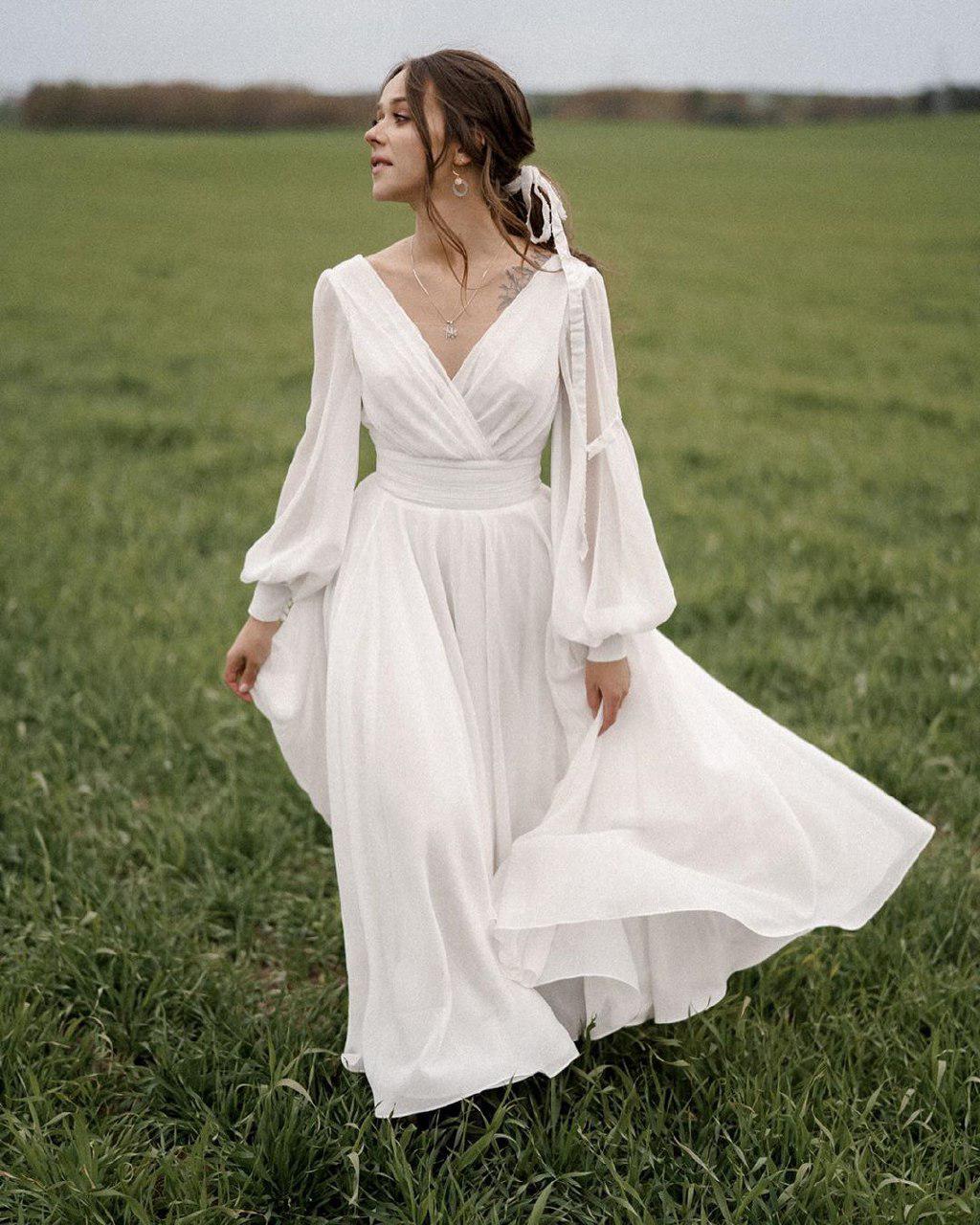 A-line midi wedding dress Paulina with long volumised sleeves by Ange Etoiles. 1