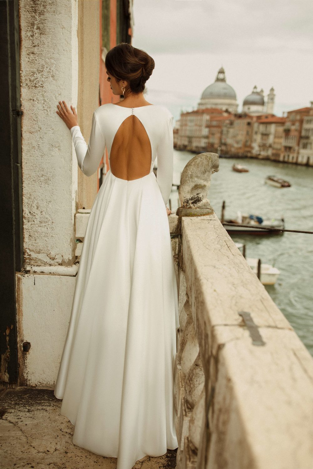 Classic wedding dress Charlen with a V-neckline and a belt at the waist by Rara Avis at Dell' Amore Bridal, Auckland, NZ. 1