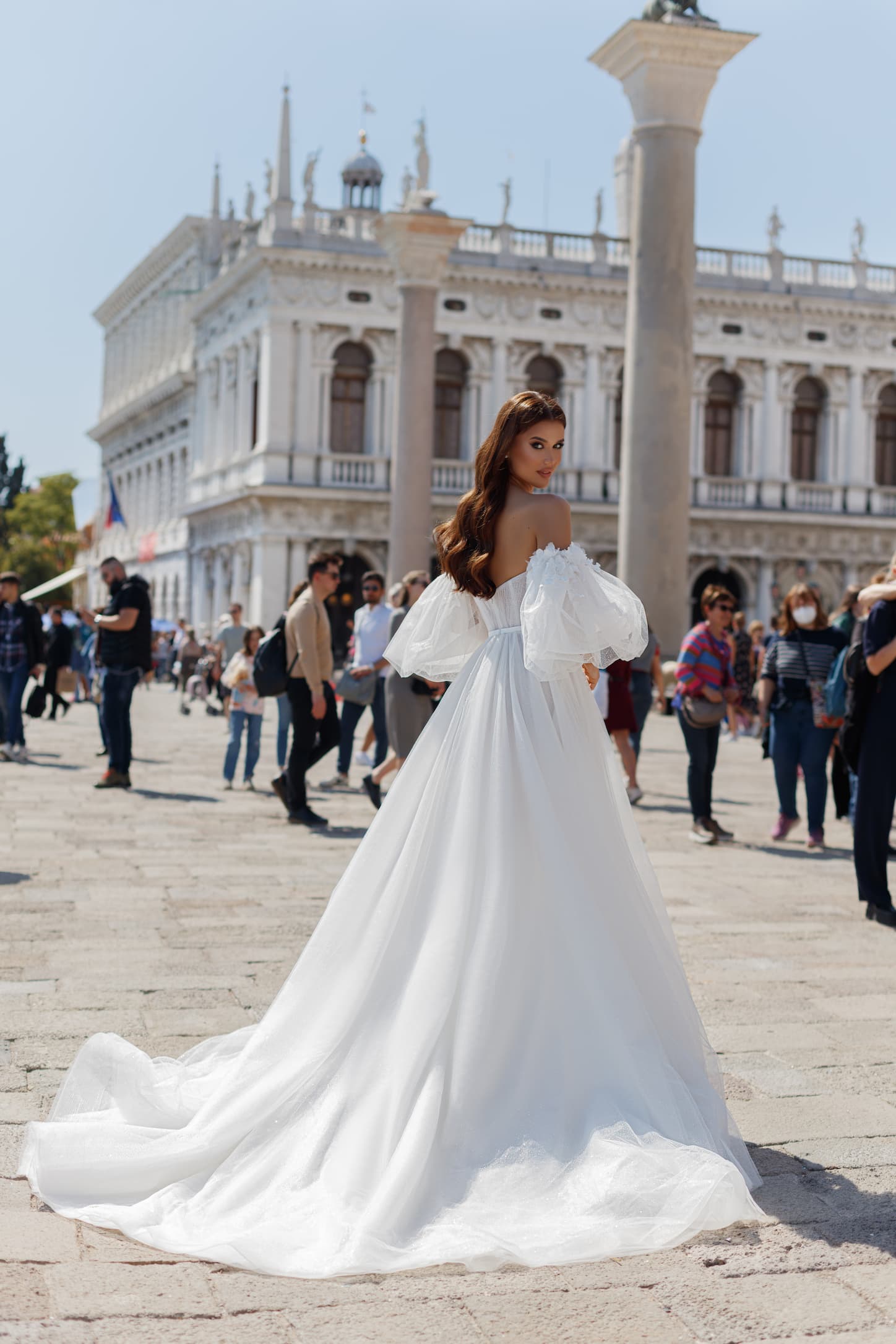 Princess style sparkling wedding gown charmaine with removable sleeves, v-neckline and split on the skirt by oksana mukha, nz 2