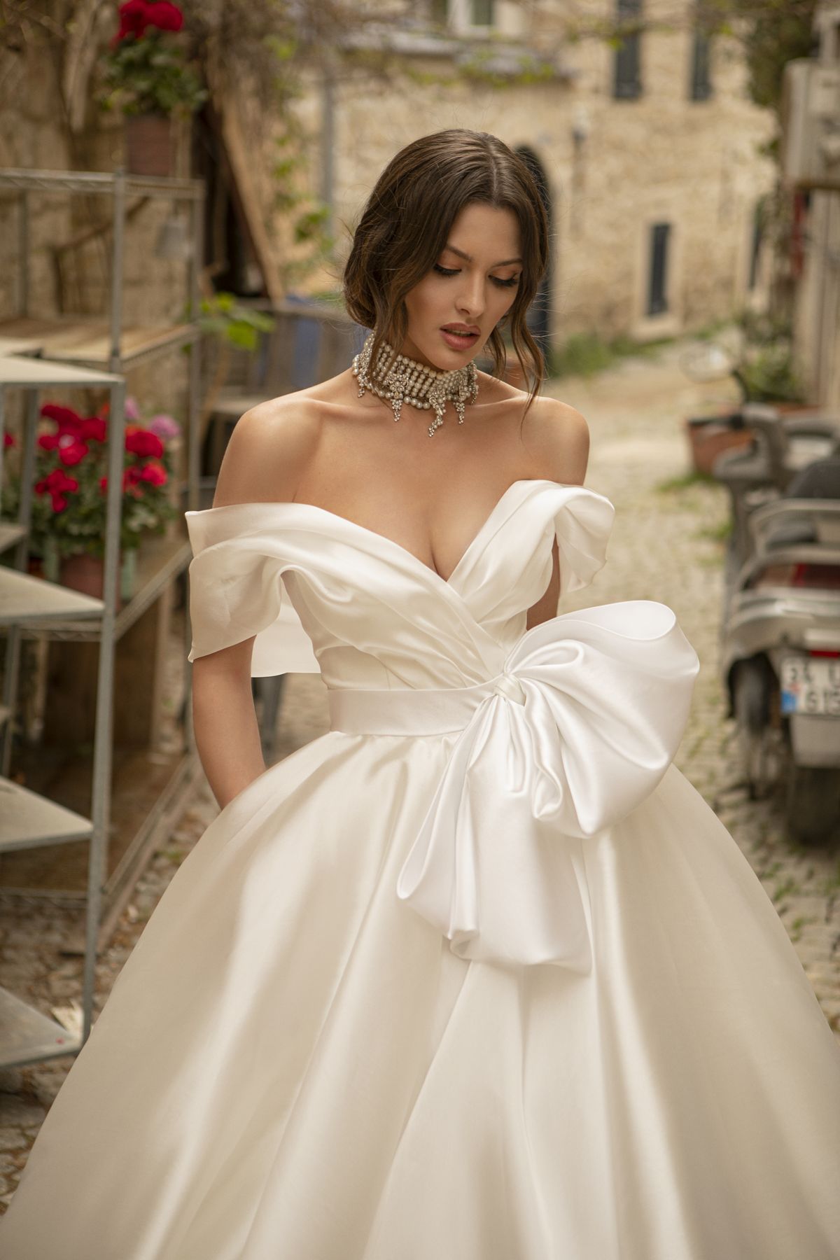 Satin white wedding gown Stella with a bow, off-shoulder sleeves and a-line skirt by Oksana Mukha designer 6