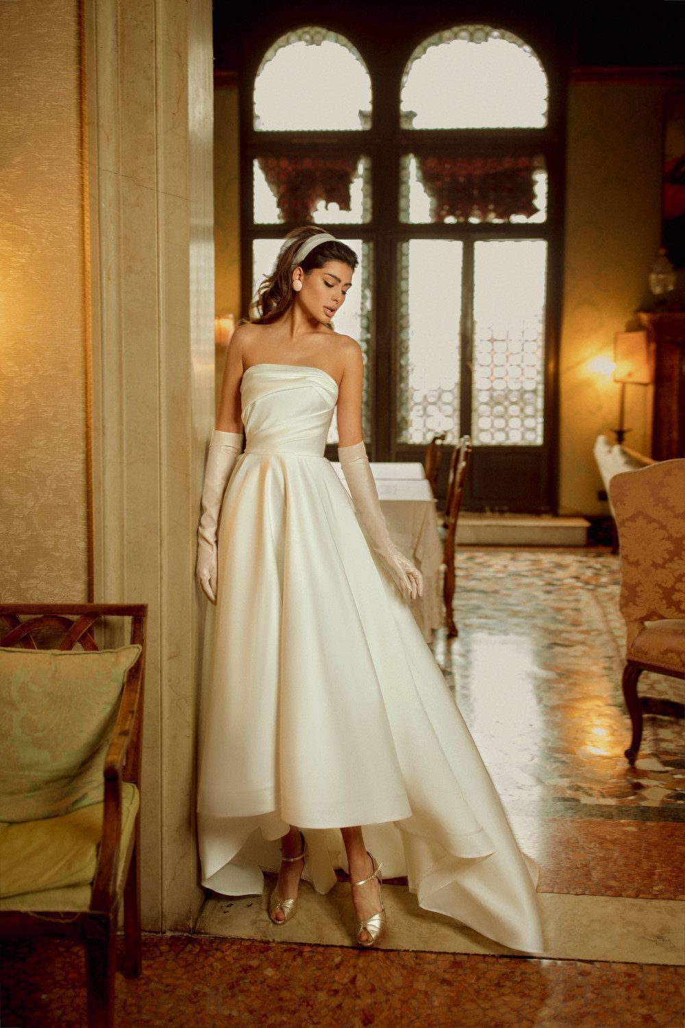 Satin simple midi wedding dress Fara with an elongated train by Rara Avis at Dell'Amore Bridal, Auckland, NZ. 1