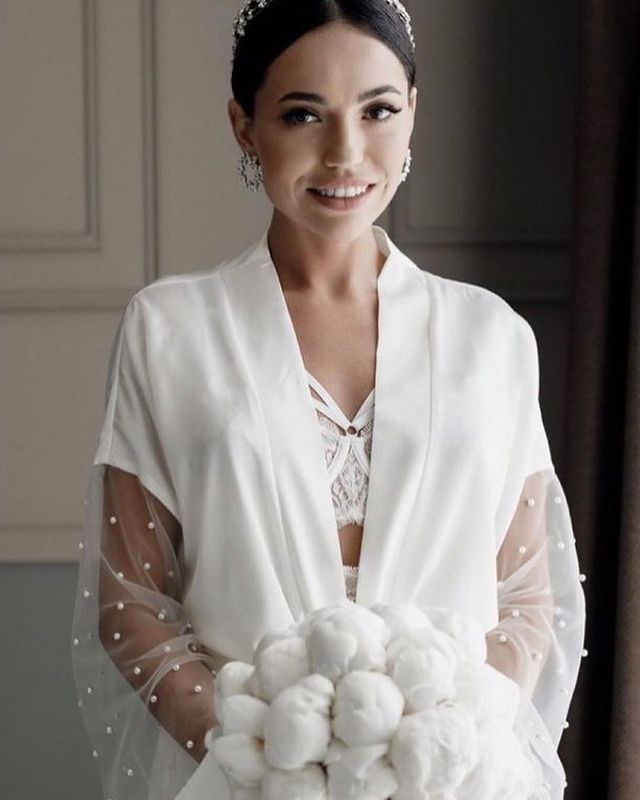 Rara Avis long white bridesmaid robe Ivetta with long transparent lace sleeves at Dell'Amore Bridal, NZ.2