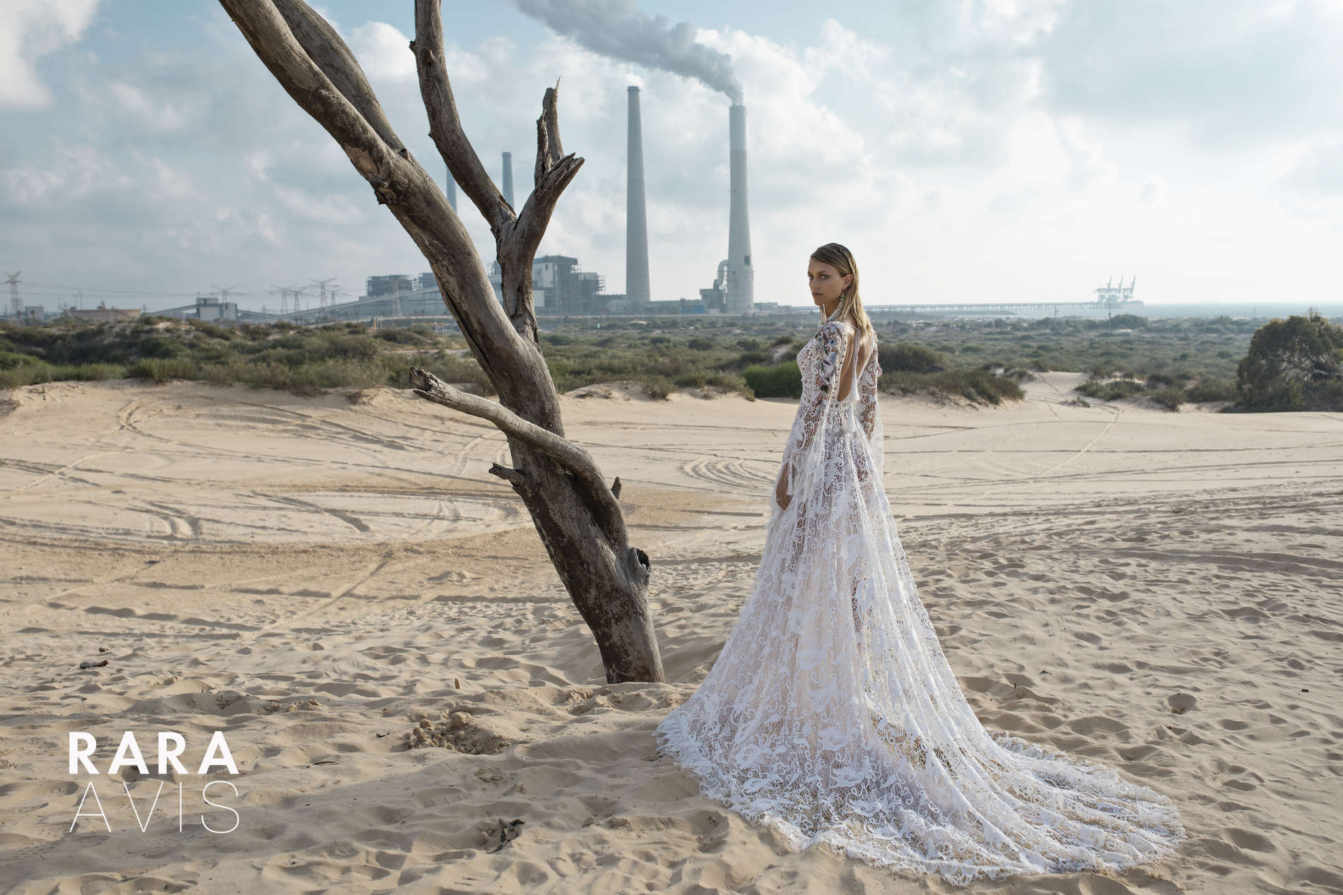 A-line boho style wedding gown Kortal by Rara Avis with split skirt, lace sleeves decorated with colourful embroideries, Dell'Amore Bridal, Auckland, 1