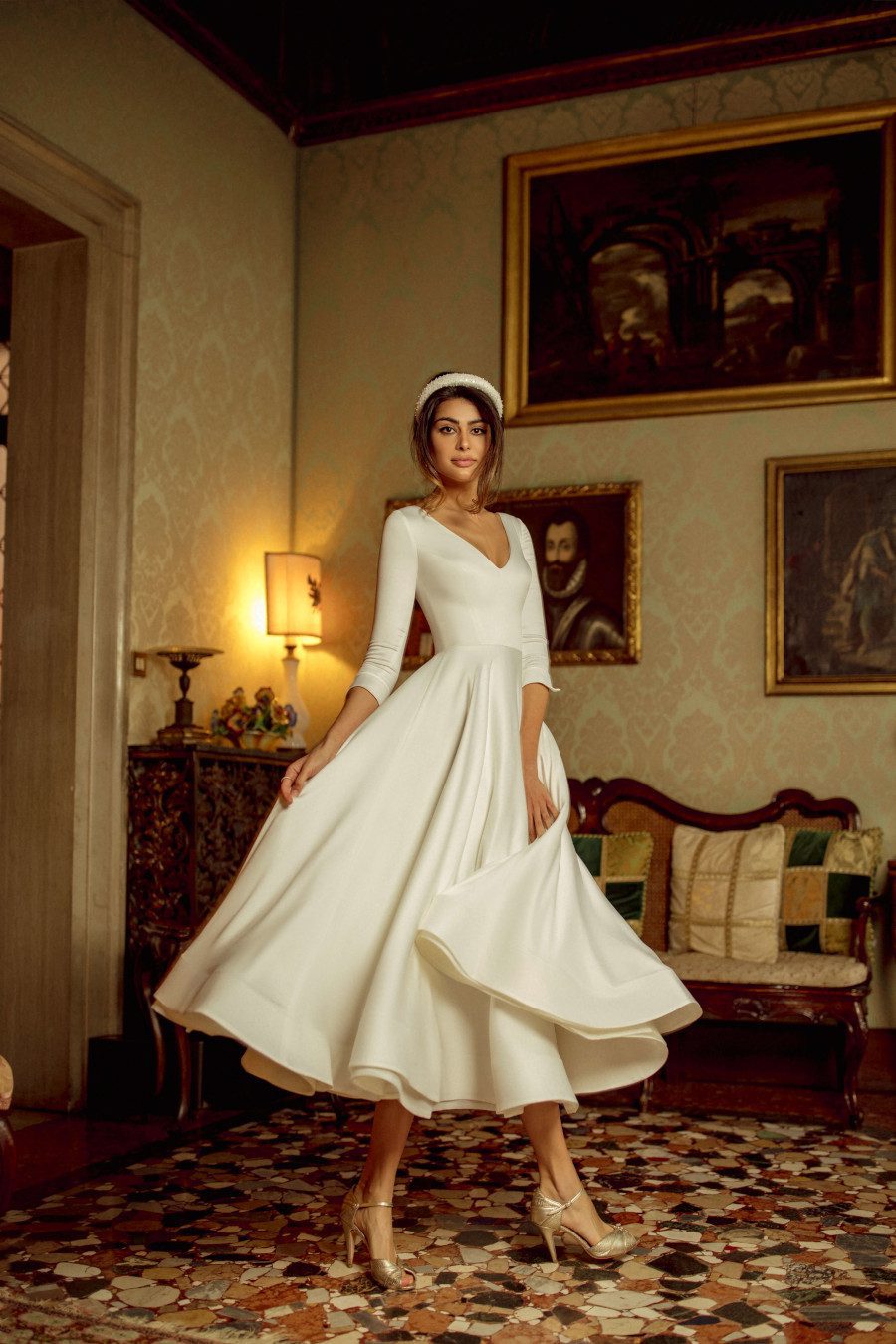 Simple white midi wedding dress Kriss with 3/4 sleeves and V-neckline by Rara Avis at Dell'Amore Bridal, Auckland, NZ. 3