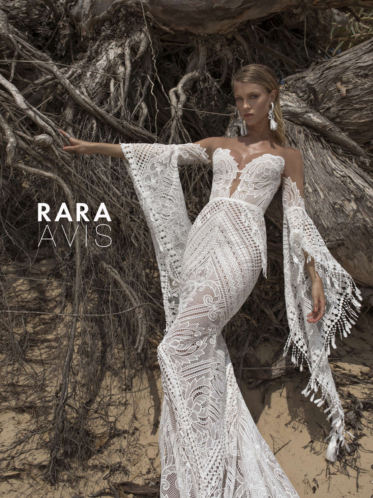 sexy boho wedding dress Lari by Rara Avis with mermaid silhouette, statement long sleeves and deep sweetheart neckline. 3