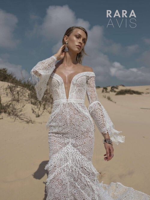 sexy bohemian wedding dress Luchian by Rara Avis with fit and flare silhouette, plunging neckline and long lace sleeves, image 1