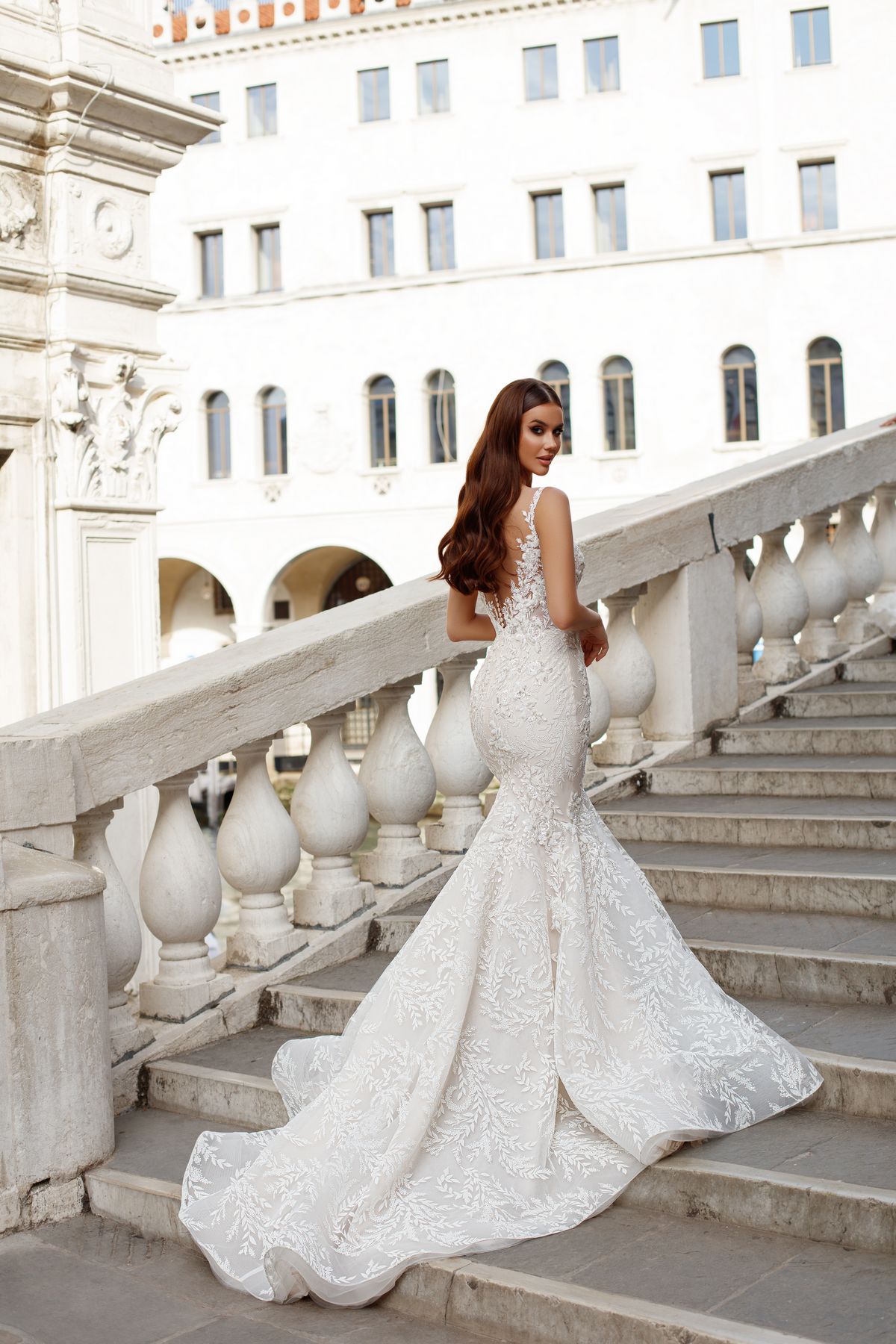 Mermaid silhouette Ioanna wedding dress by Oksana Mukha with cut-off above the knee line at Dell'Amore Bridal, Auckland, NZ 3