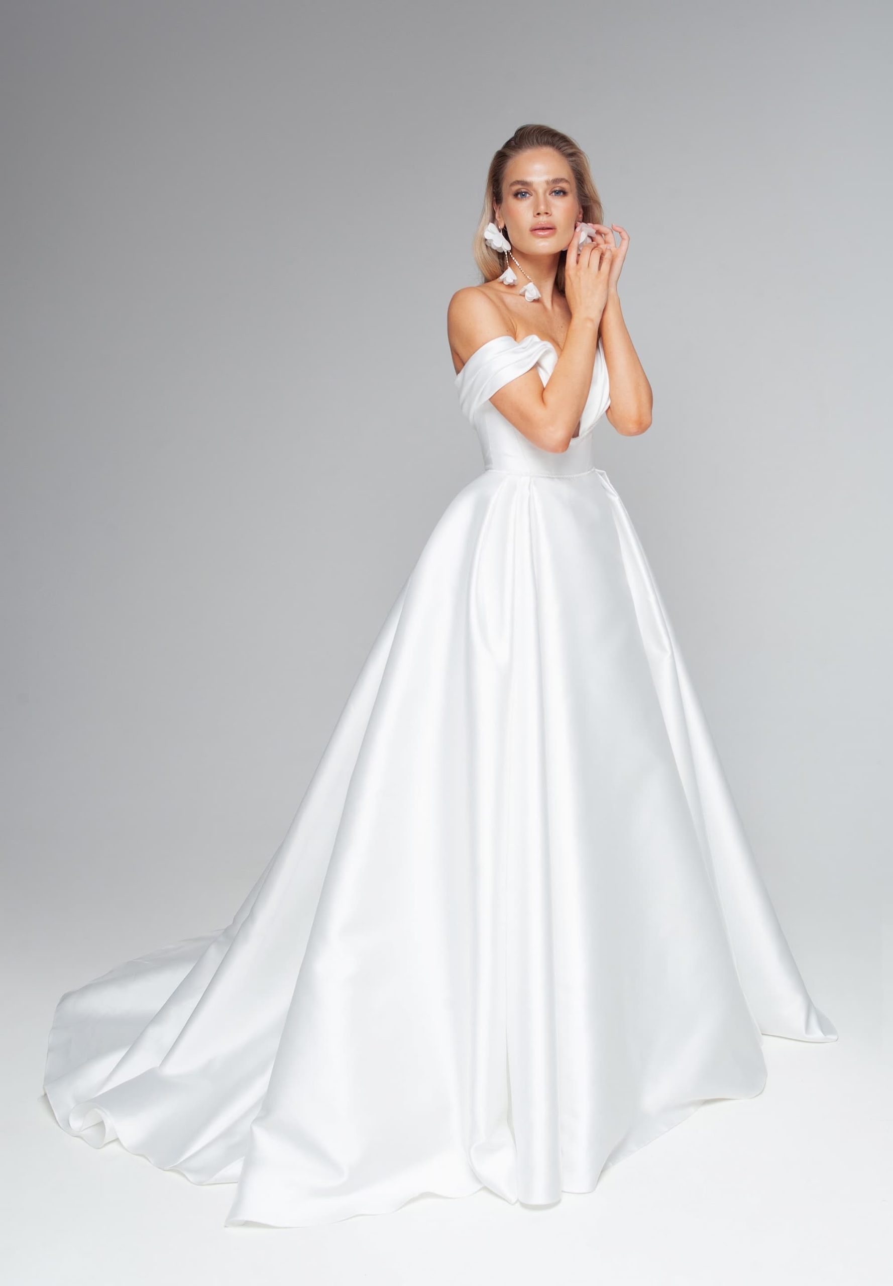 Rara Avis satin off-shoulder wedding dress Rhine at Dell'Amore Bridal, NZ. 3