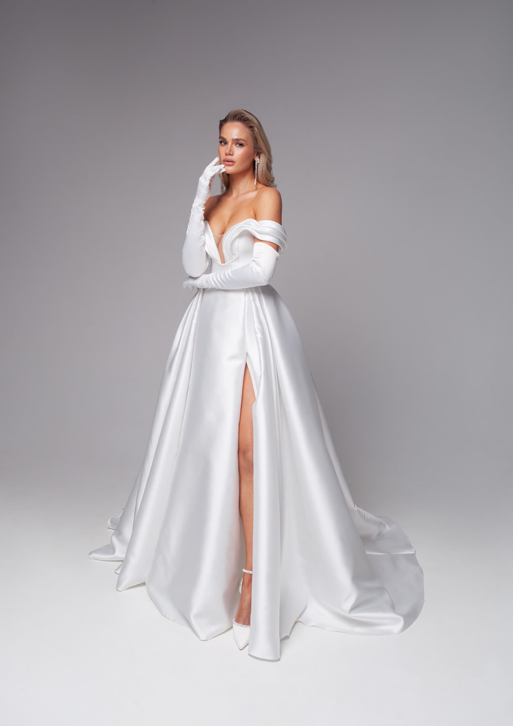 Rara Avis satin off-shoulder wedding dress Rhine at Dell'Amore Bridal, NZ. 1