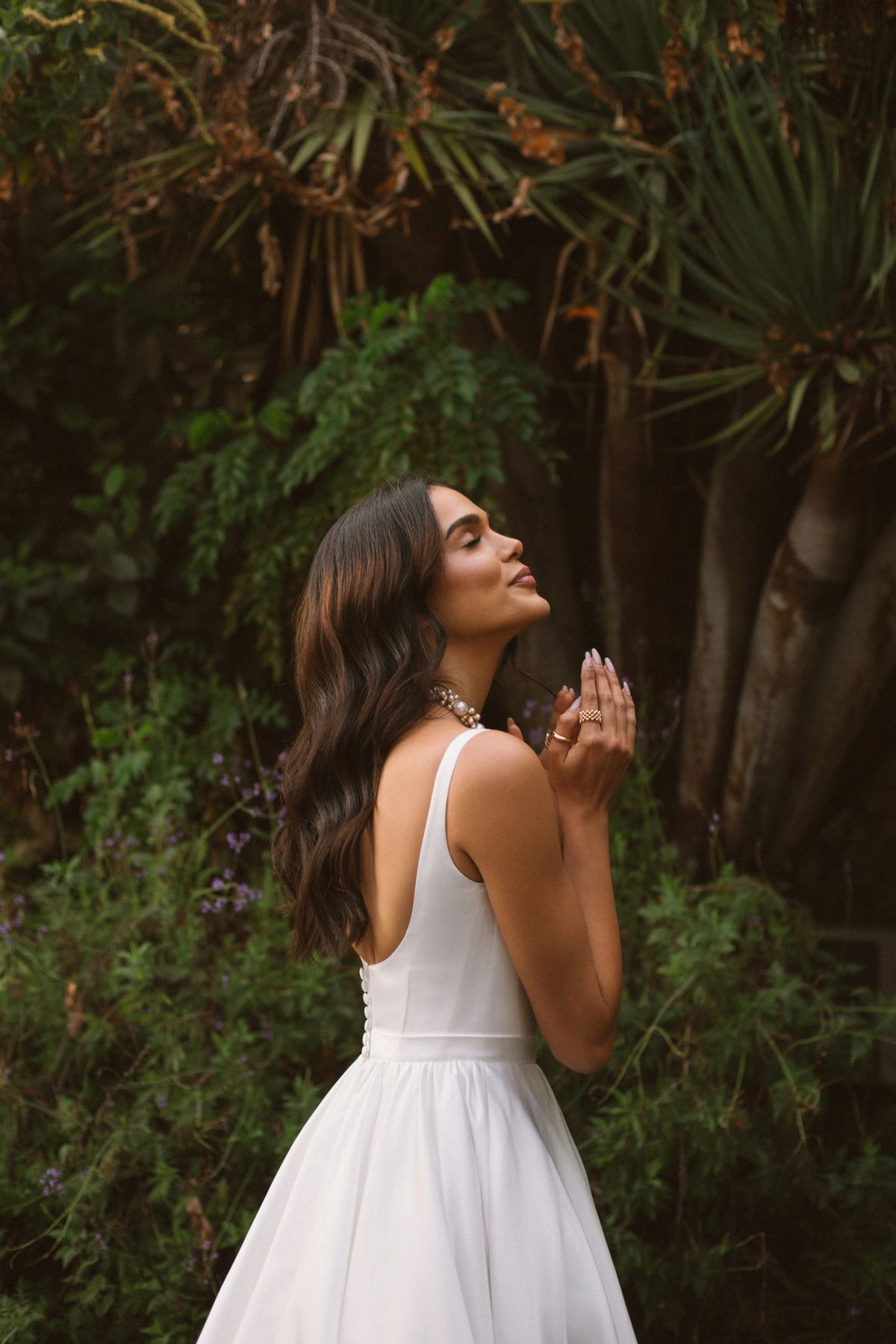 Rara Avis simple satin wedding dress Vela with a long train at Dell'Amore Bridal, NZ 1