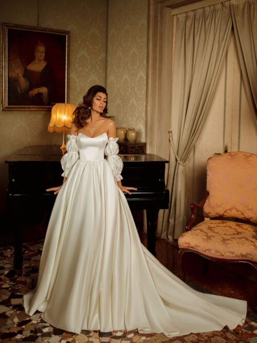 White airy wedding dress with corset and removable sleeves by Rara Avis at Dell'Amore Bridal, Auckland, NZ. 6