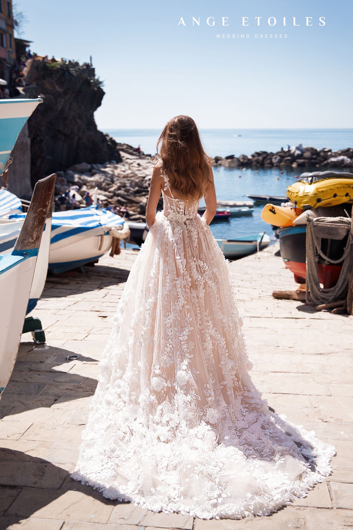 White bridal dress Zemfira in a princess style decorated with the flowers on the skirt by Ange Etoiles at Dell'Amore Bridal, Auckland. 2